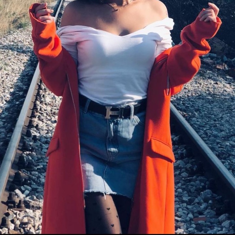 Orange Trench Coat with Structured Silhouette and Modern Design